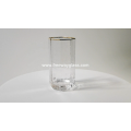 highball glass with gold rim